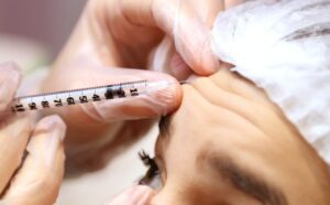 medical professional injecting Botox® into the forehead of a patient to help with wrinkles