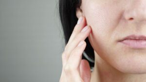 Close up of a woman's face with enlarged pores